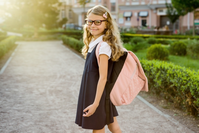 Young girl to school