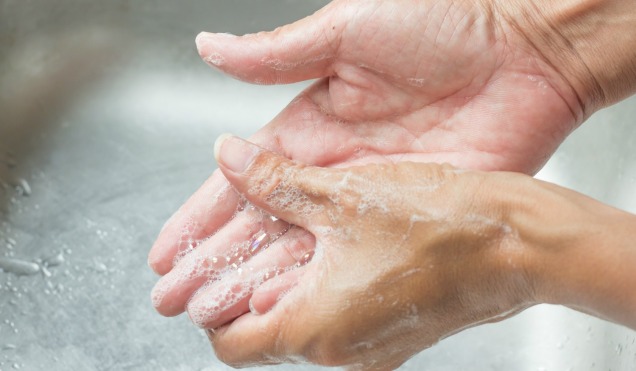 hands being washed with Soap and water